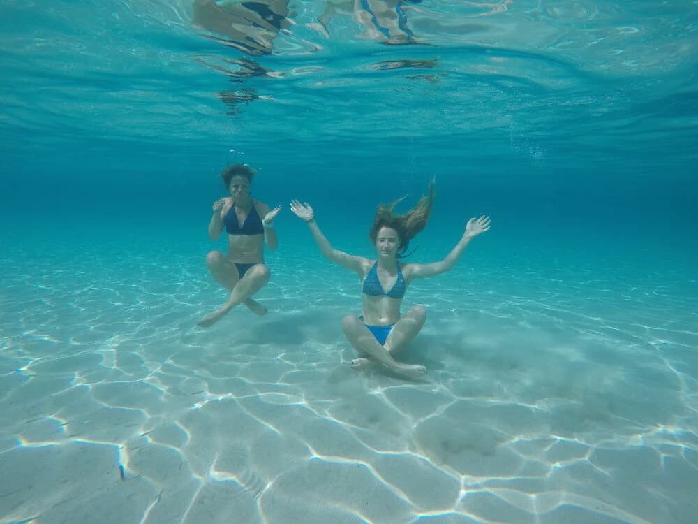 Two people under water